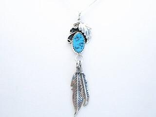 Genuine Sleeping Beauty Turquoise set in Sterling Silver Pendant. Leaf and Feather design. Free 18" Sterling Silver Chain with Purchase of Pendant. Created by Navajo Artist Rita Dawes.