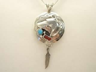 Genuine Turquoise and Coral set in Sterling Silver Pendant. Beautiful Wolf Design. Free 18" Sterling Silver Chain with Purchase of Pendant. Signed R. by the Navajo Artist