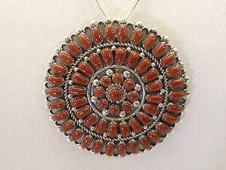 Genuine Blood Red Coral set in Sterling Silver Pendant. May also be worn as a brooch. Free 18" Sterling Silver Chain with Purchase of Pendant. Created by Zuni Artist M. D. Besselente. Signed.