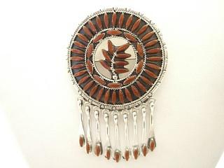 Genuine Blood Red Coral set in Sterling Silver Pendant. May also be worn as a brooch. Free 18" Sterling Silver Chain with Purchase of Pendant. Created by Zuni Artist F. Etsate. Signed.