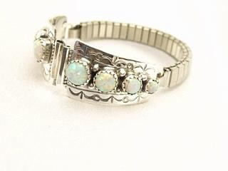 8 Fire & Ice Lab Opal Stones set in Sterling Silver Ladies Watch Tips with expandable band. Created by Navajo Artist Sheila Tso. Signed.